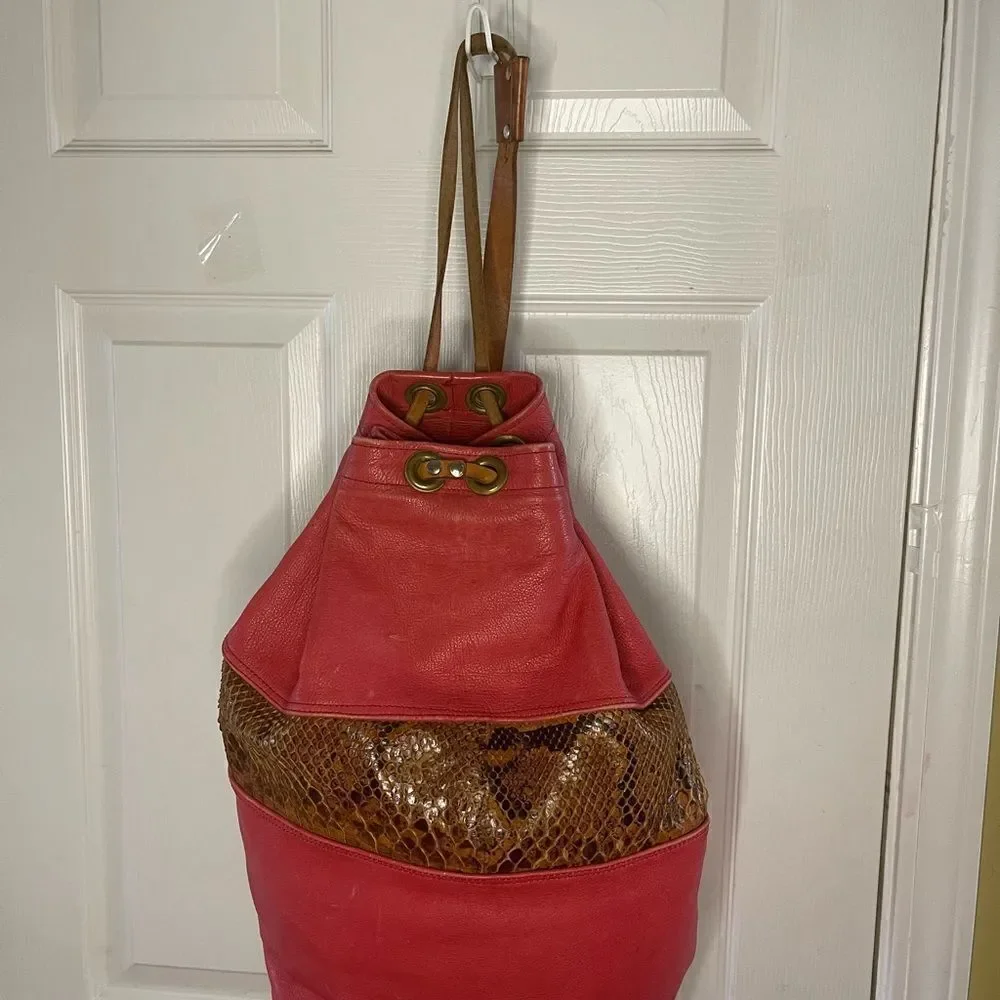 Leather orange and Brown snake skin print  Xlarge bucket bag sling back tan trap